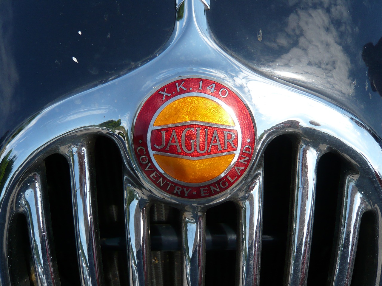 grille jaguar emblem free photo