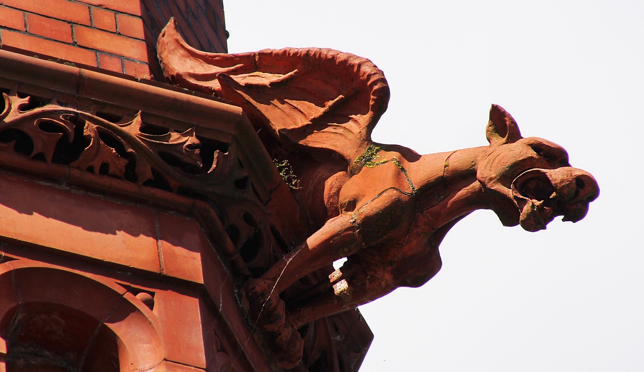 grotesque gargoyle sculpture free photo