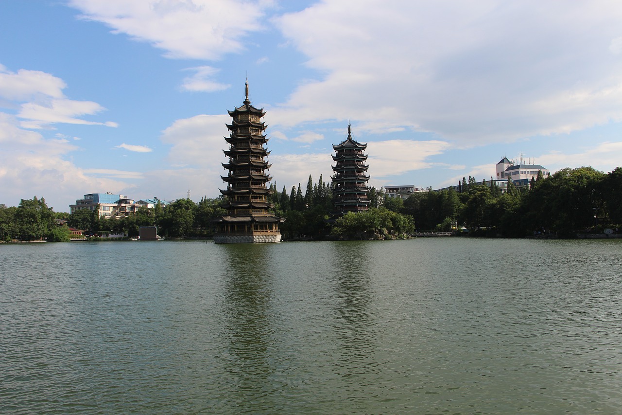 guilin sun and moon twin towers shwedagon pagoda silver pagoda free photo