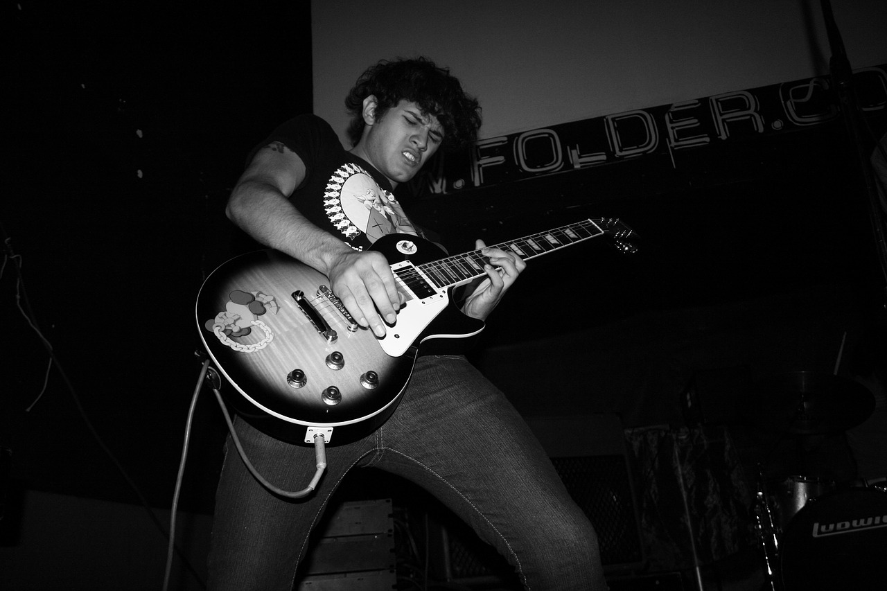 guitar guitarist rock free photo