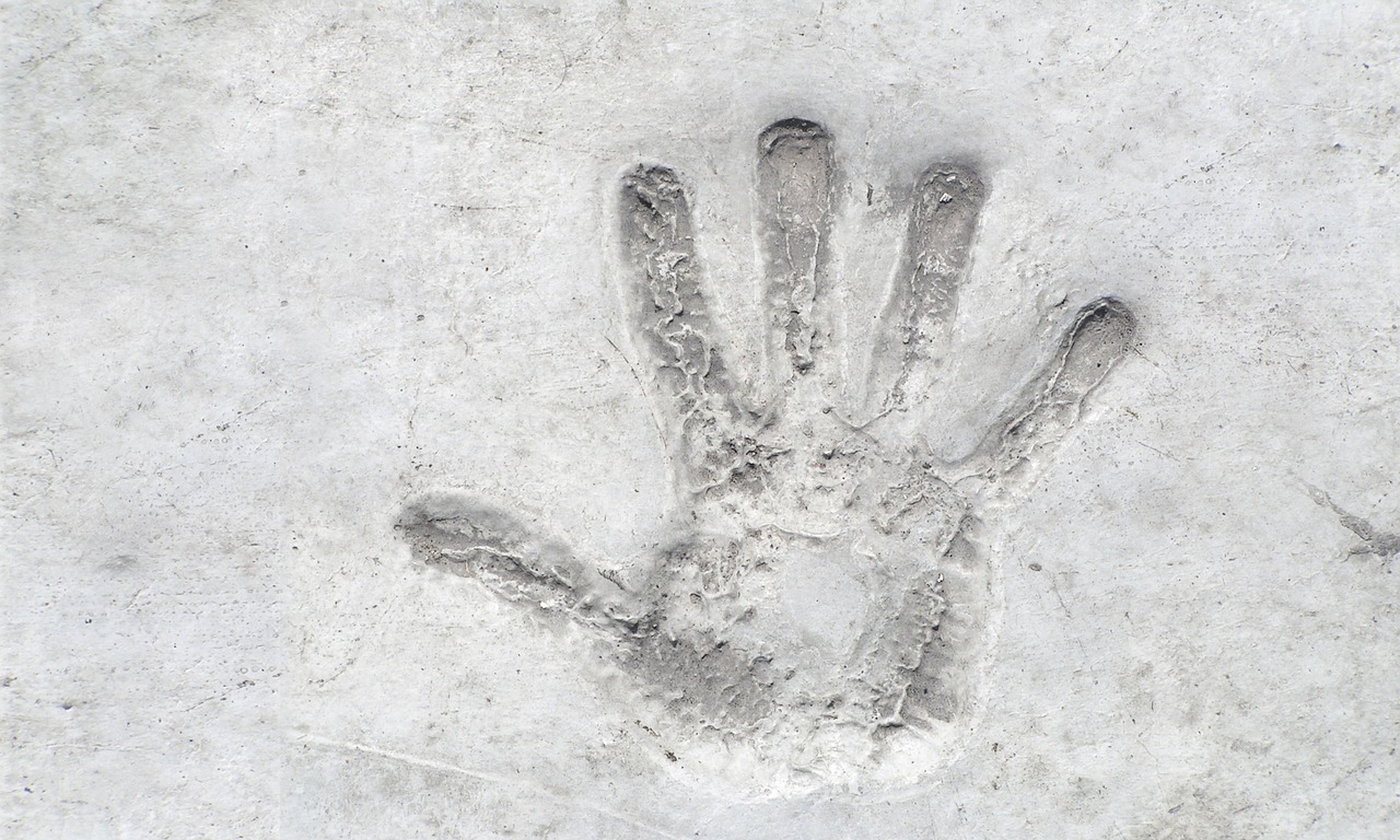hand concrete reprint free photo