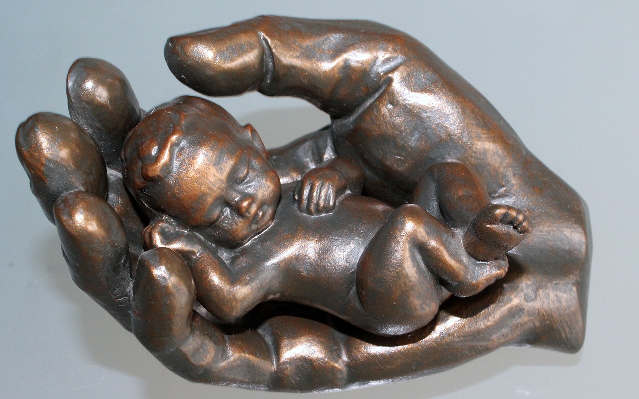 hand child bronze statue free photo