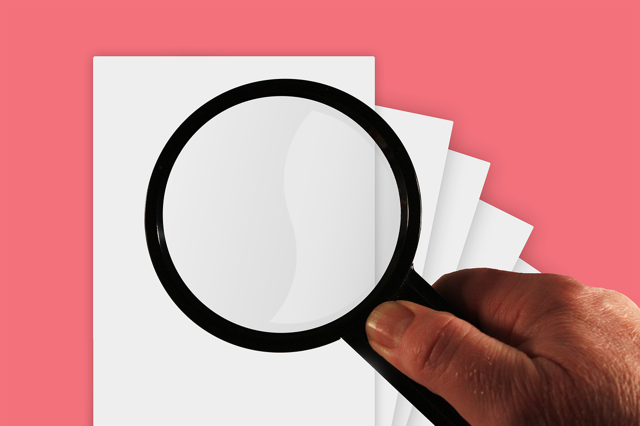 hand magnifying glass investigation free photo