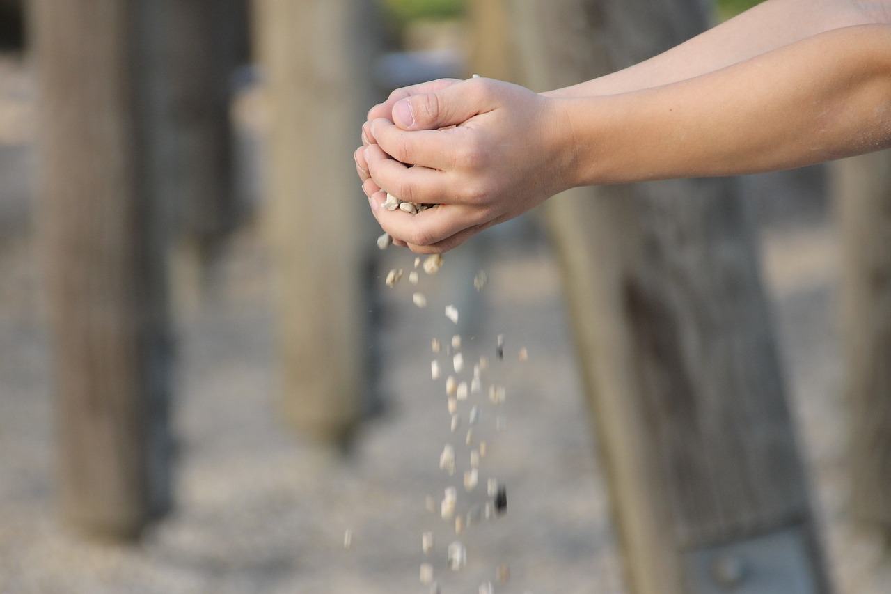 hand stones trickle free photo