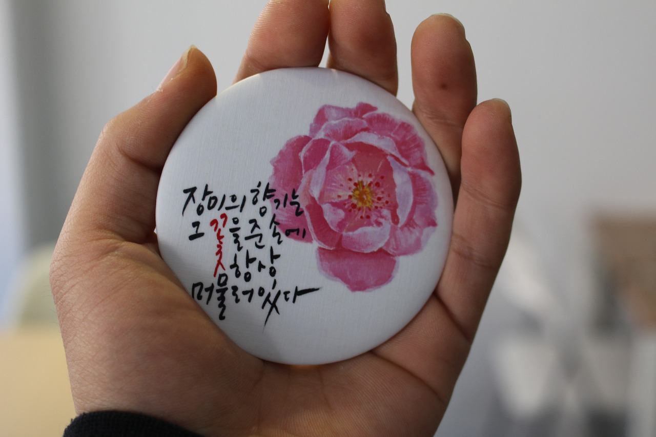 hand mirror rose calligraphy free photo