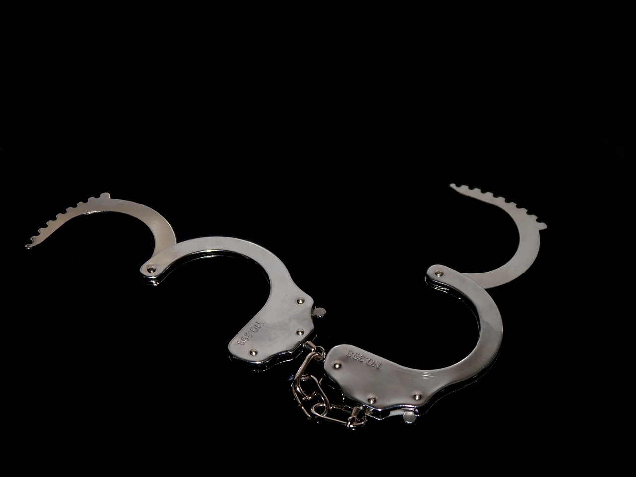 handcuffs 8 black silver free photo