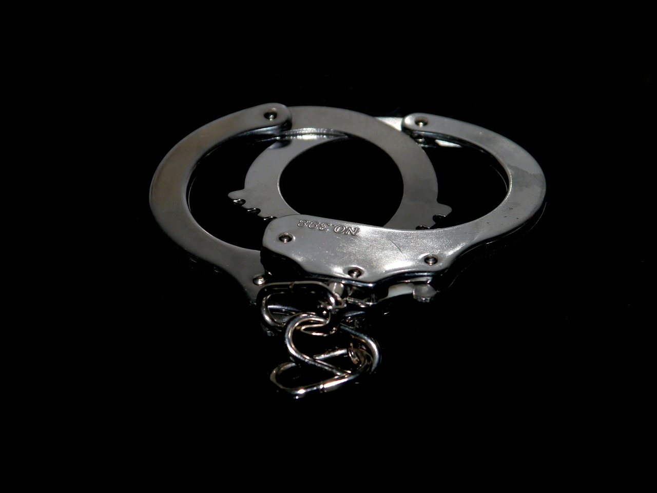 handcuffs 8 black silver free photo