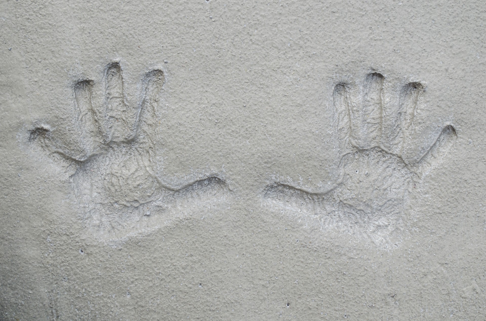 hands print cement free photo