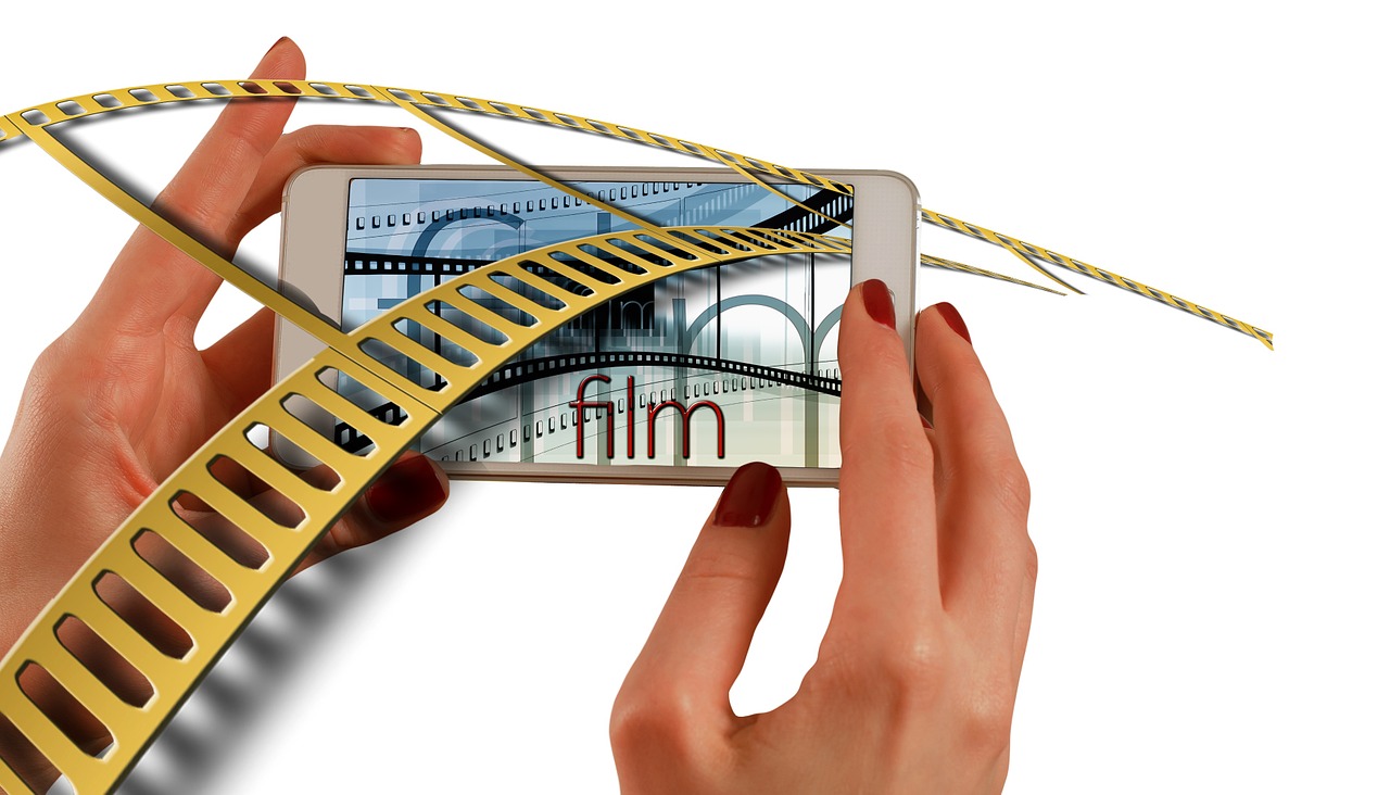 hands smartphone cinema strip free photo