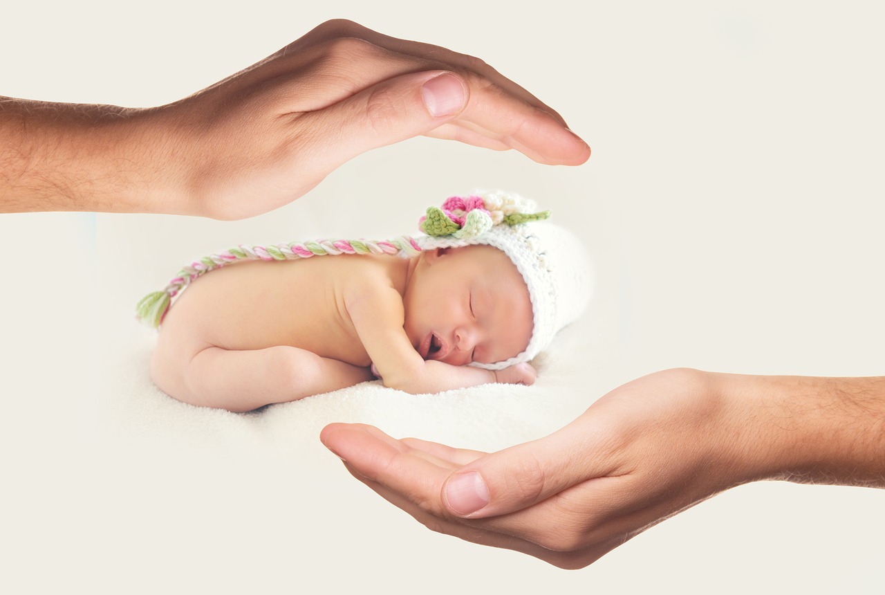 hands baby protect free photo