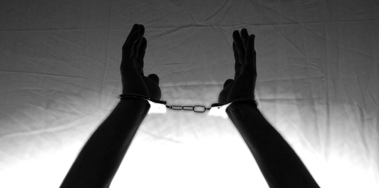 hands handcuffs tied up free photo