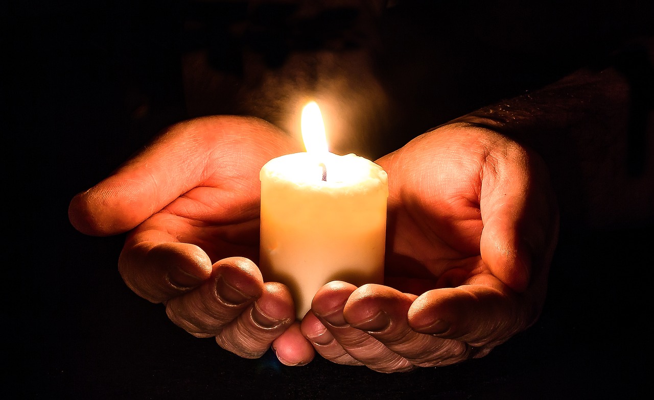 hands open candle free photo