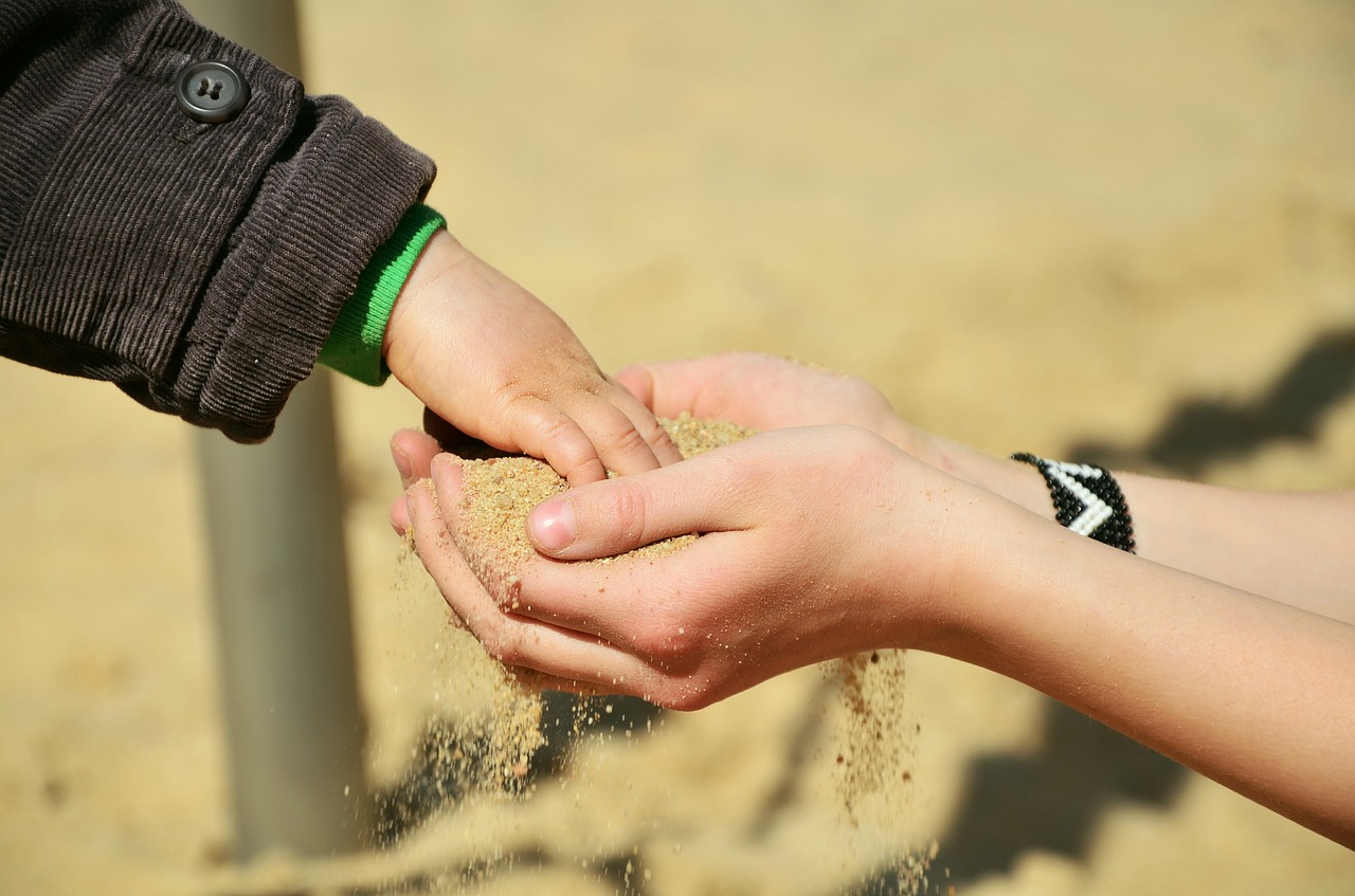 hands sand children's hands free photo