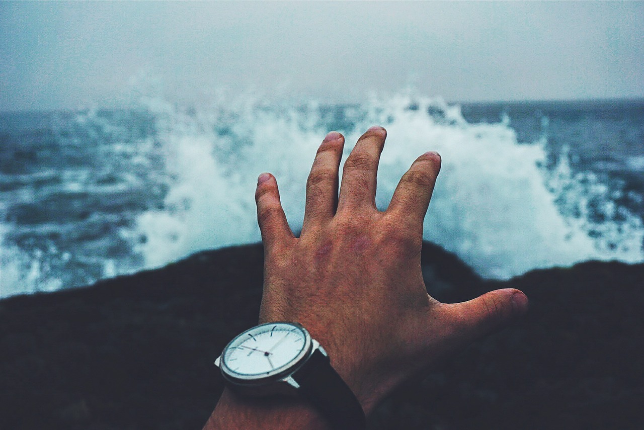 hands watch ocean free photo