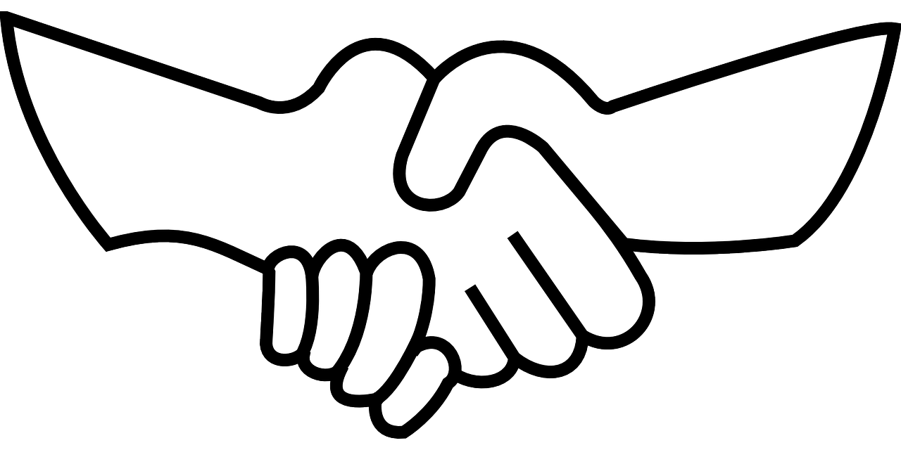 handshake business friendship free photo