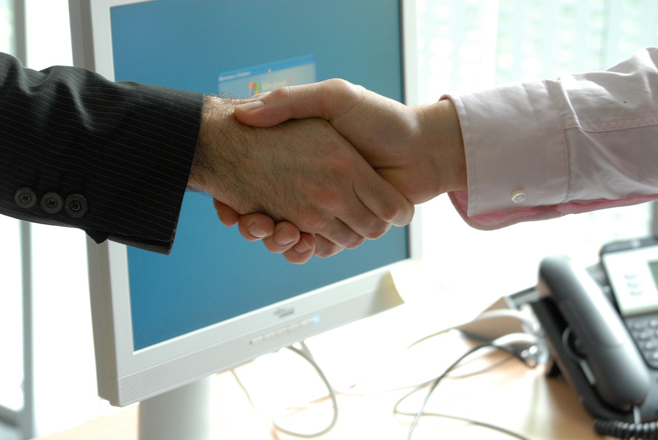 handshake business professional free photo