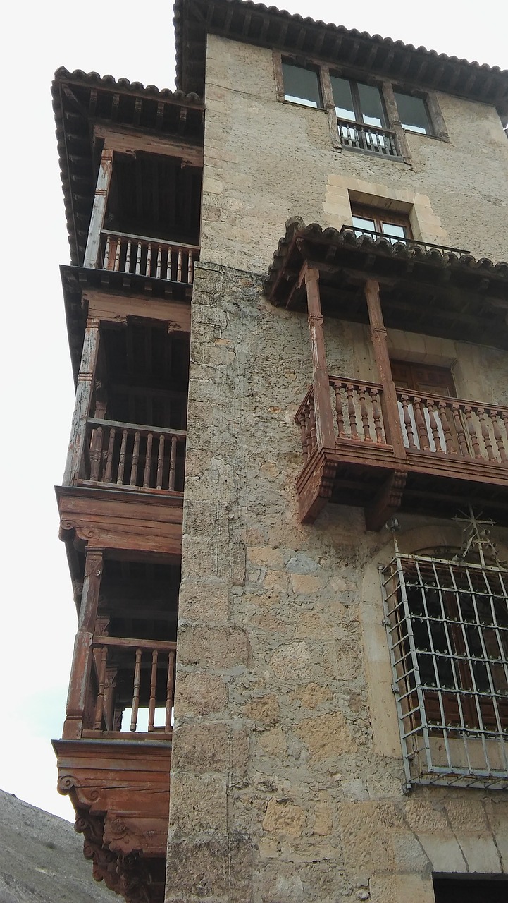 hanging houses of cuenca basin heritage free photo