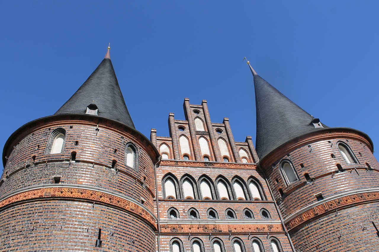 hanseatic city of lübeck germany holsten gate is more than 300 years old free photo