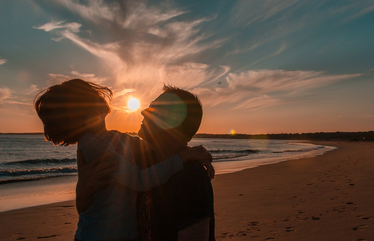 happy people beach galicia backlight free photo