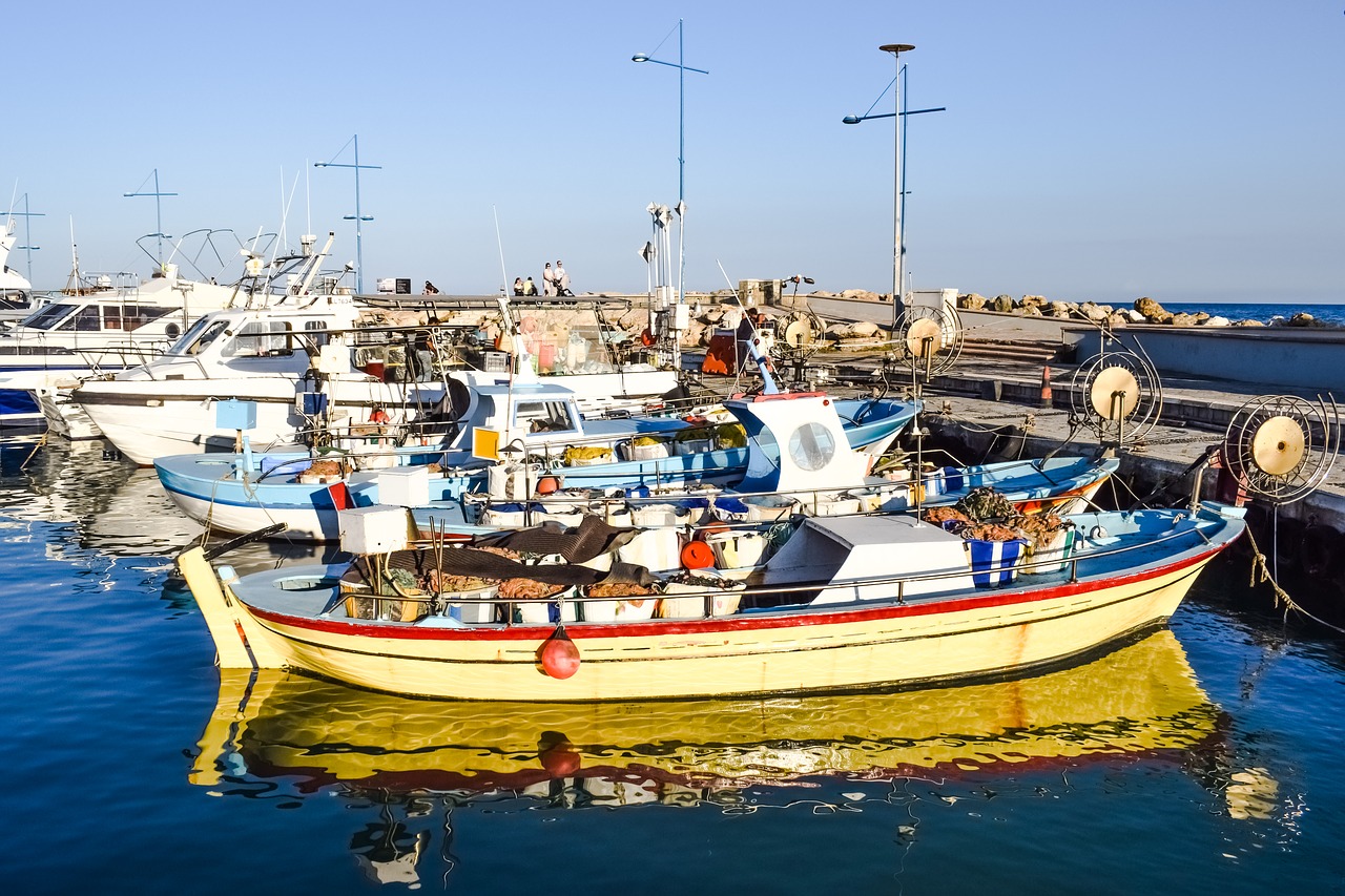 harbor fishing boats reflections free photo