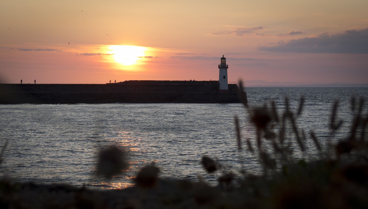 harbour lighthouse sunset free photo