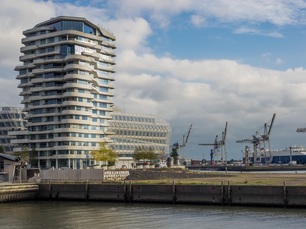 harbour city office building cranes free photo