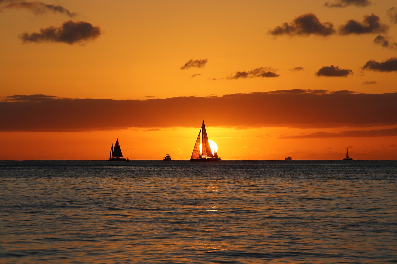 hawaii  sailing boat  sunset free photo