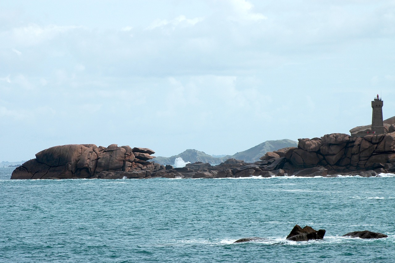 headland sea lighthouse free photo