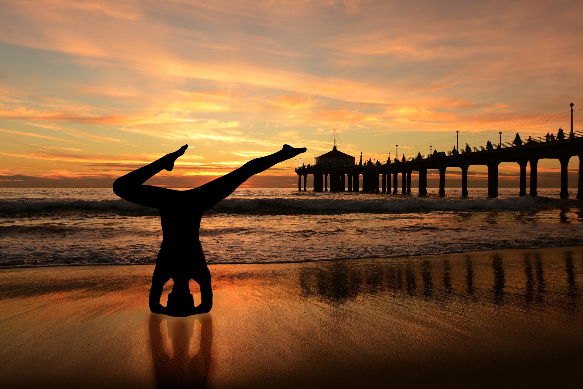 headstand yoga beach sunset beach free photo