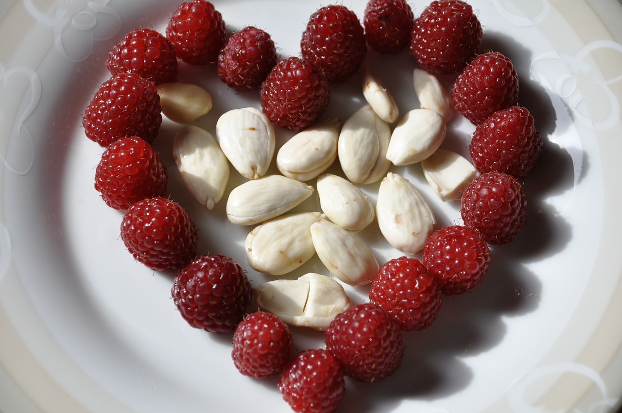 heart almonds raspberries free photo