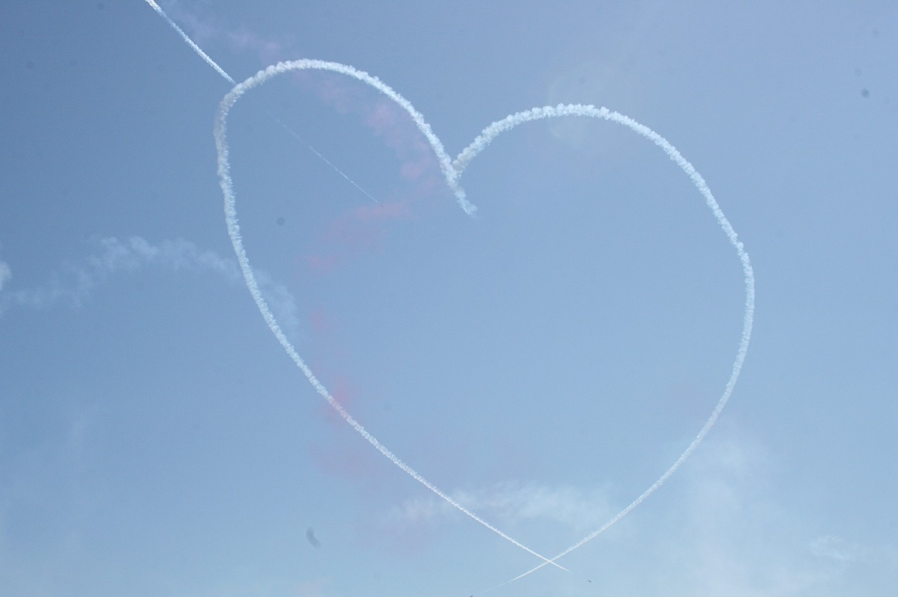 heart sky aircraft free photo