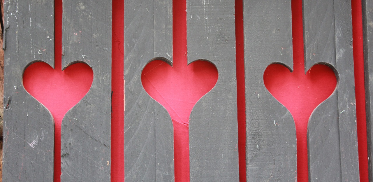 hearts in the fence wooden slats wood free photo