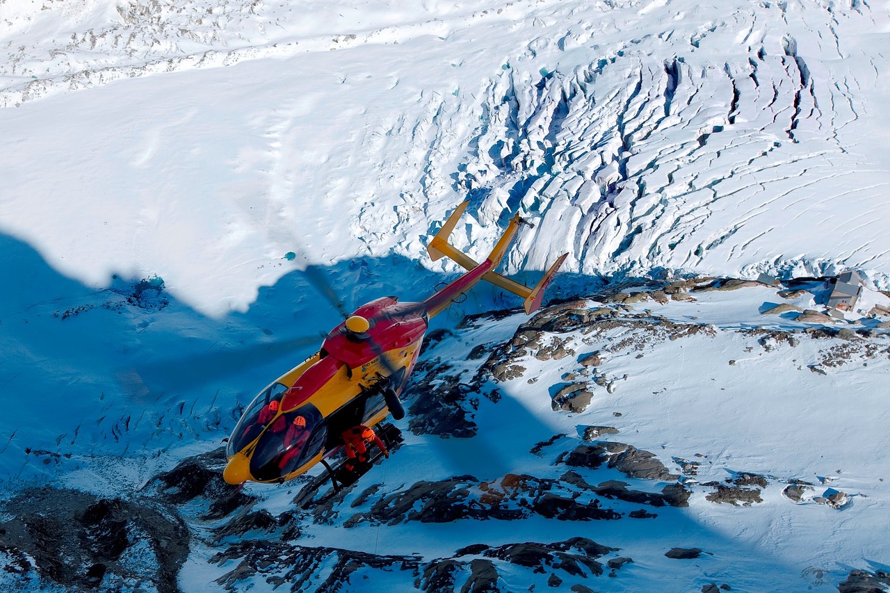 helicopter mountain snow free photo