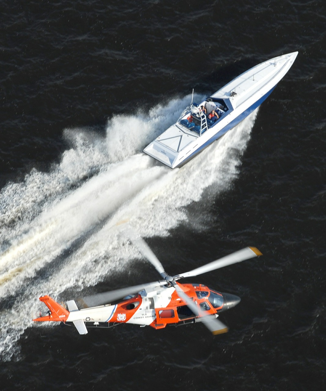 helicopter speedboat us coast guard free photo