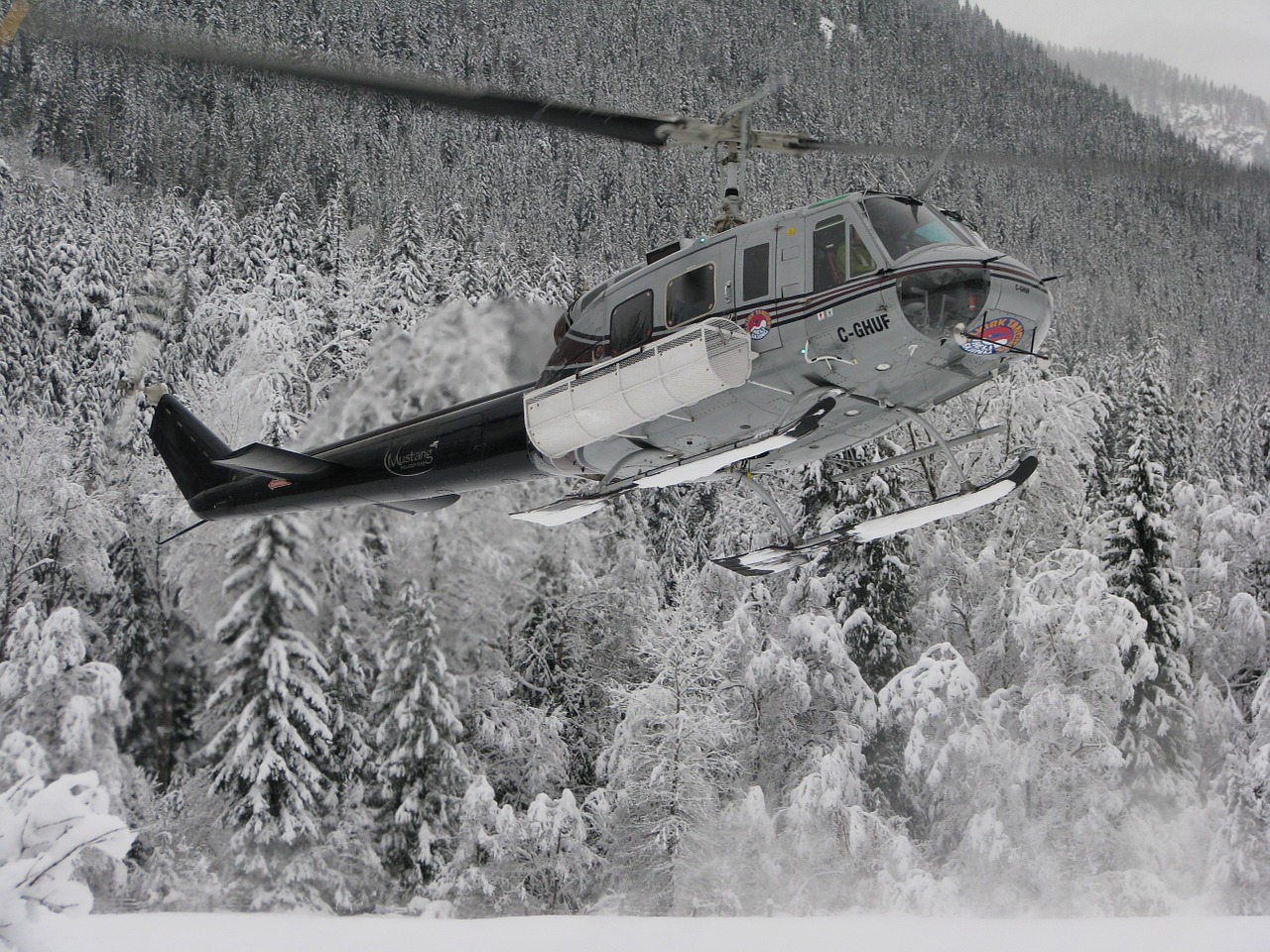 helicopter snow mountain free photo