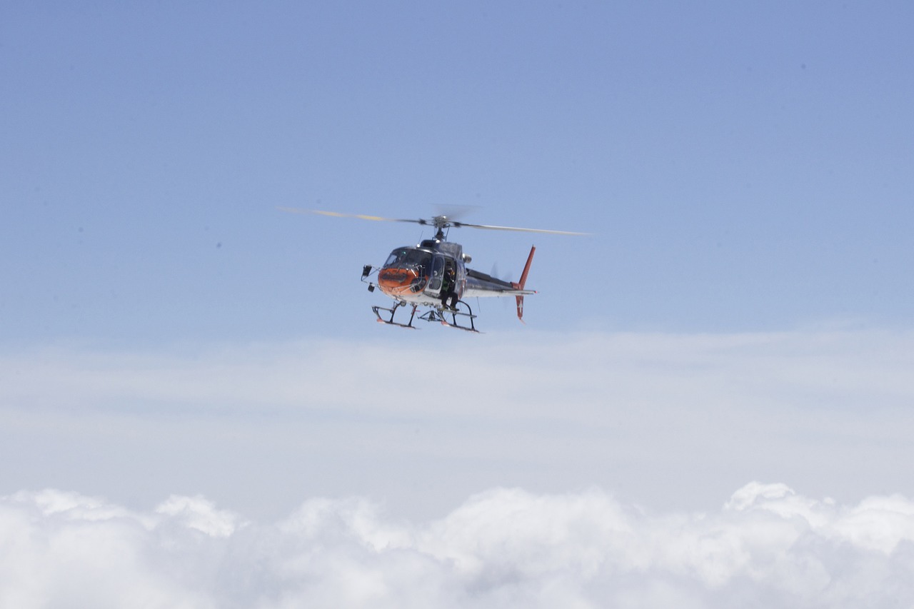 helicopter sky clouds free photo