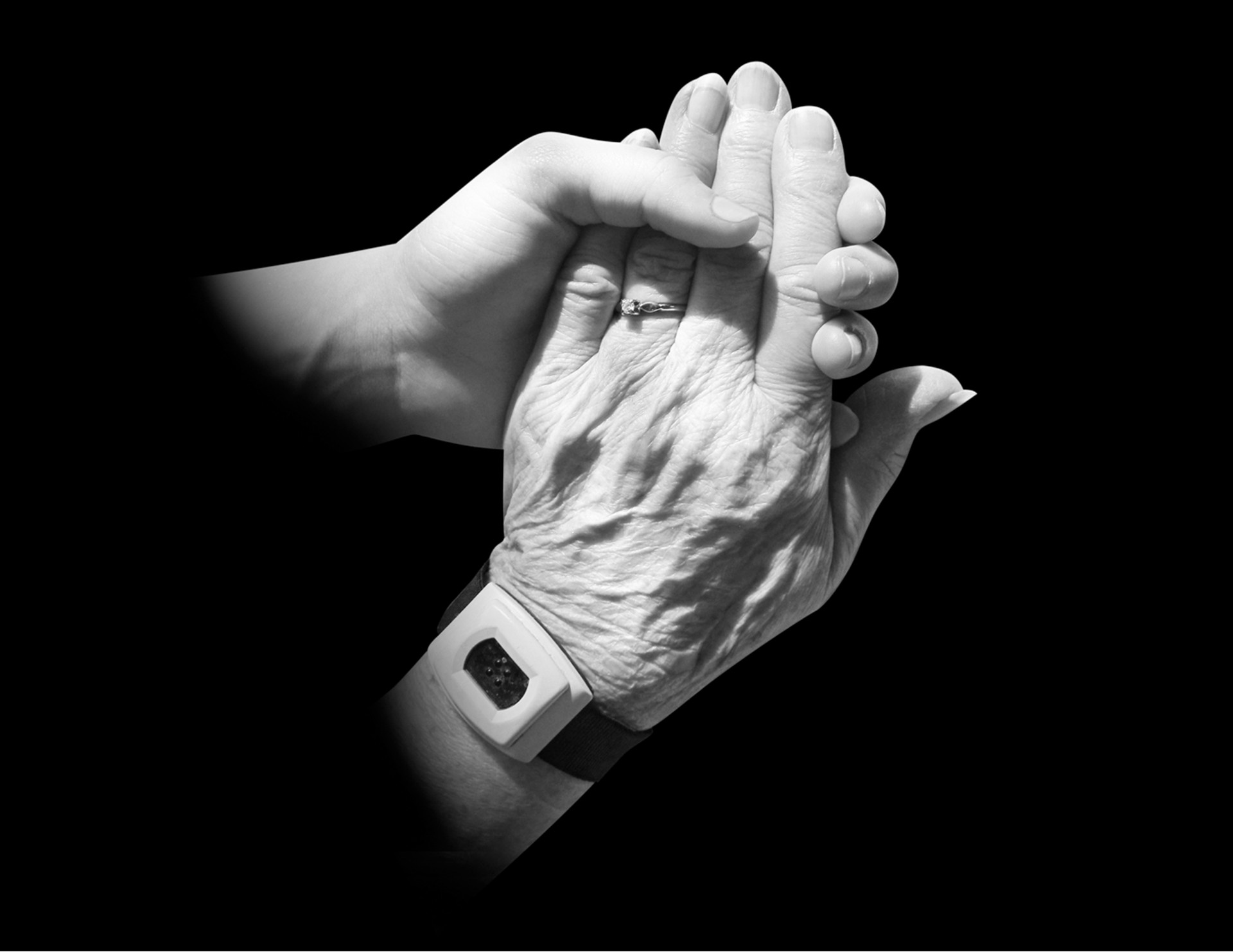 young hand senior's hand holding free photo
