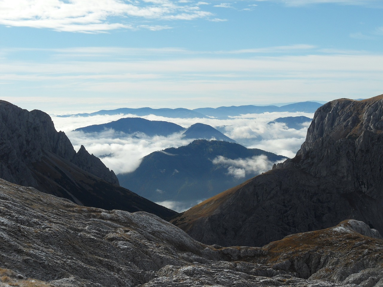 high mountain above the clouds cloud free photo