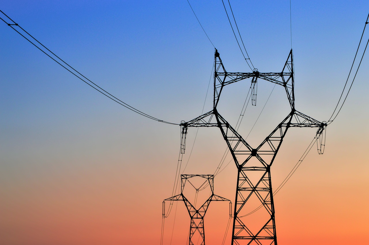 high-voltage tower  tower of electricity  sunset free photo