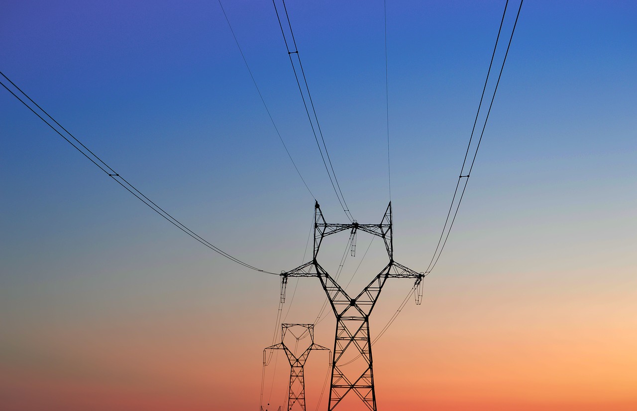high-voltage tower  tower of electricity  sunset free photo