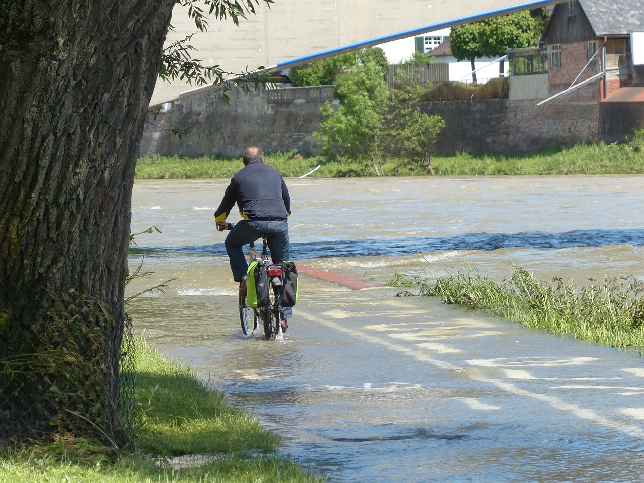 high water cyclists wet free photo