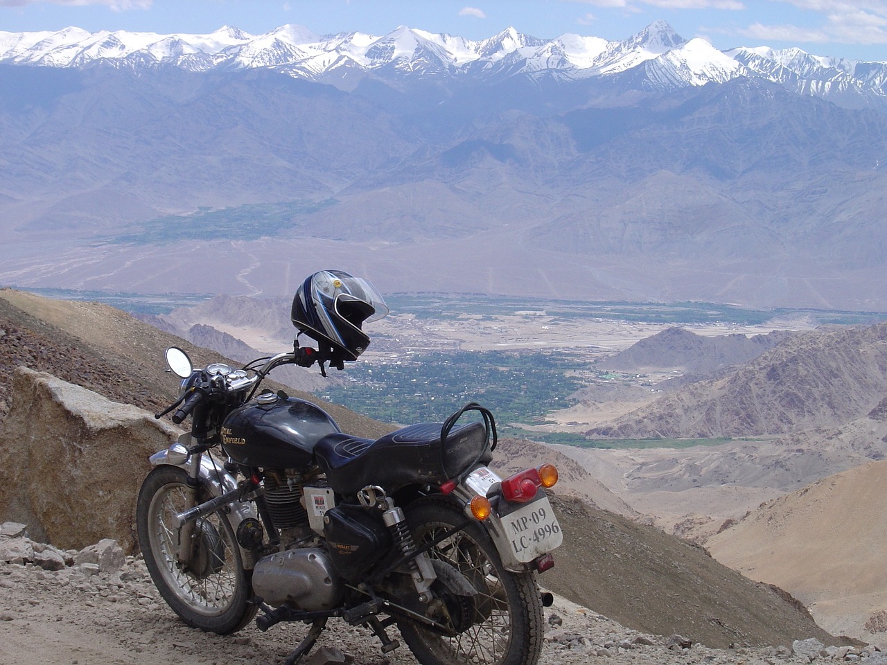 highest motorable road pilgrimage on royal enfield khardungla pass free photo