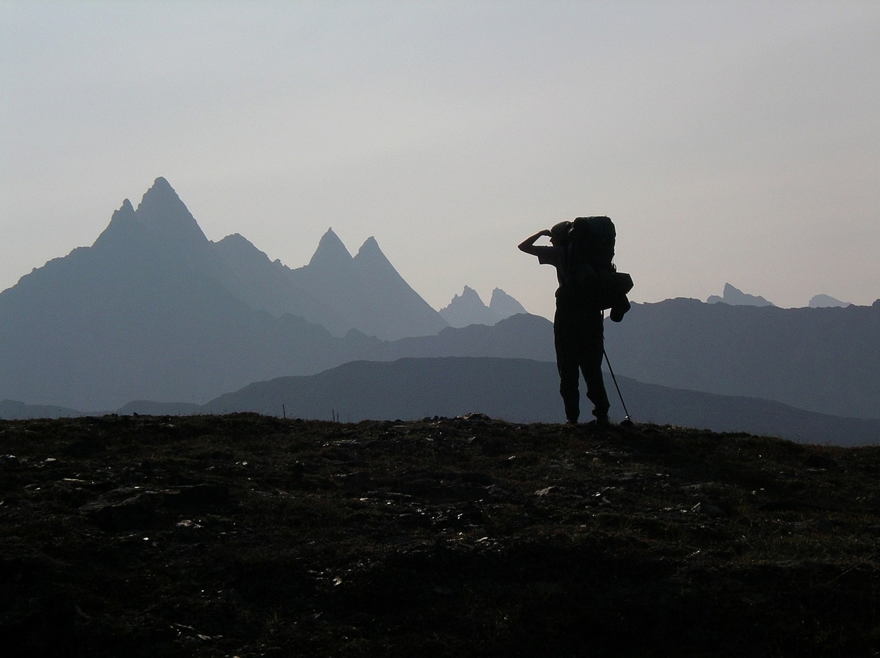 hiker mountains looking free photo