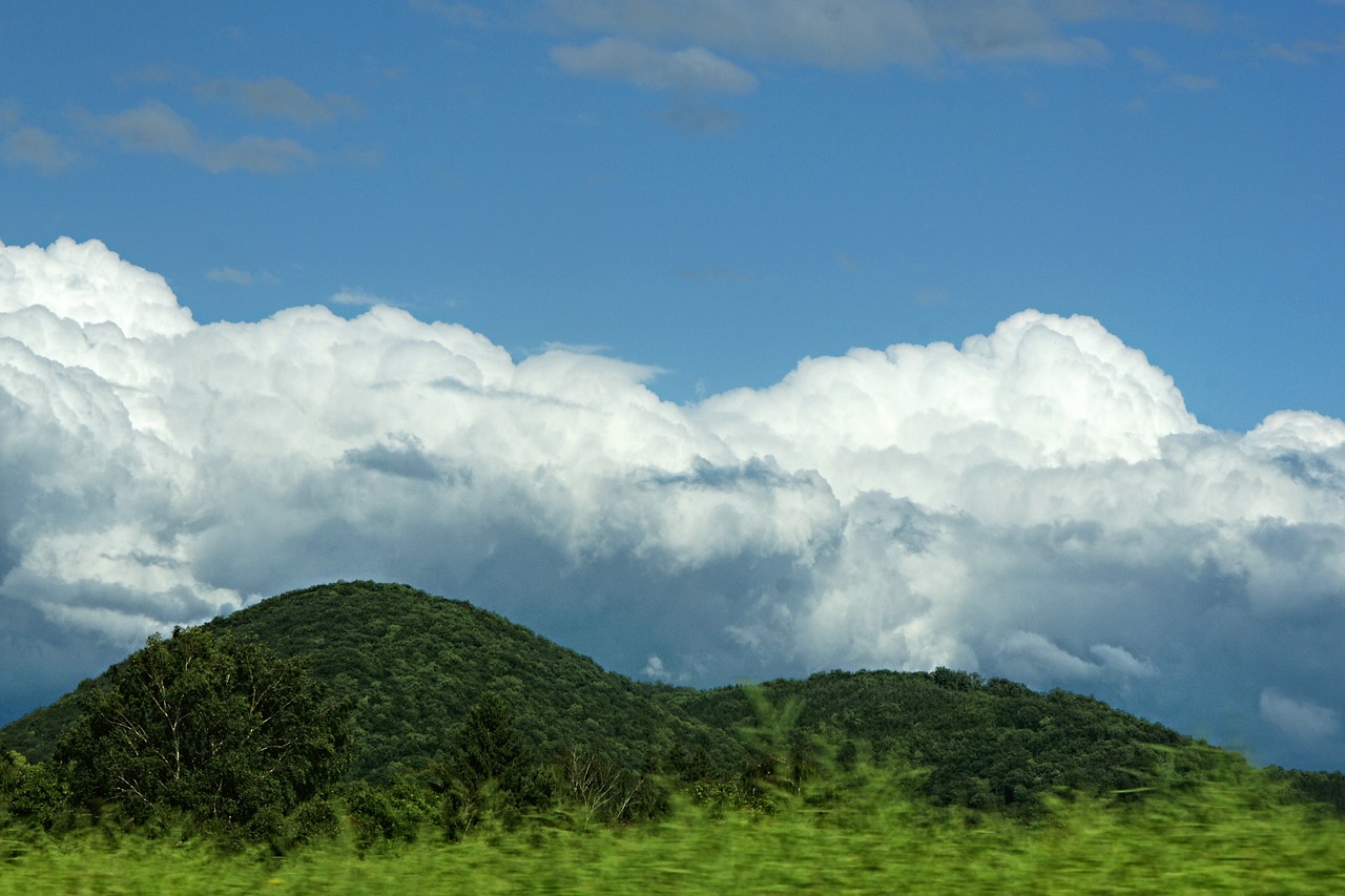 hill landscape clouds free photo