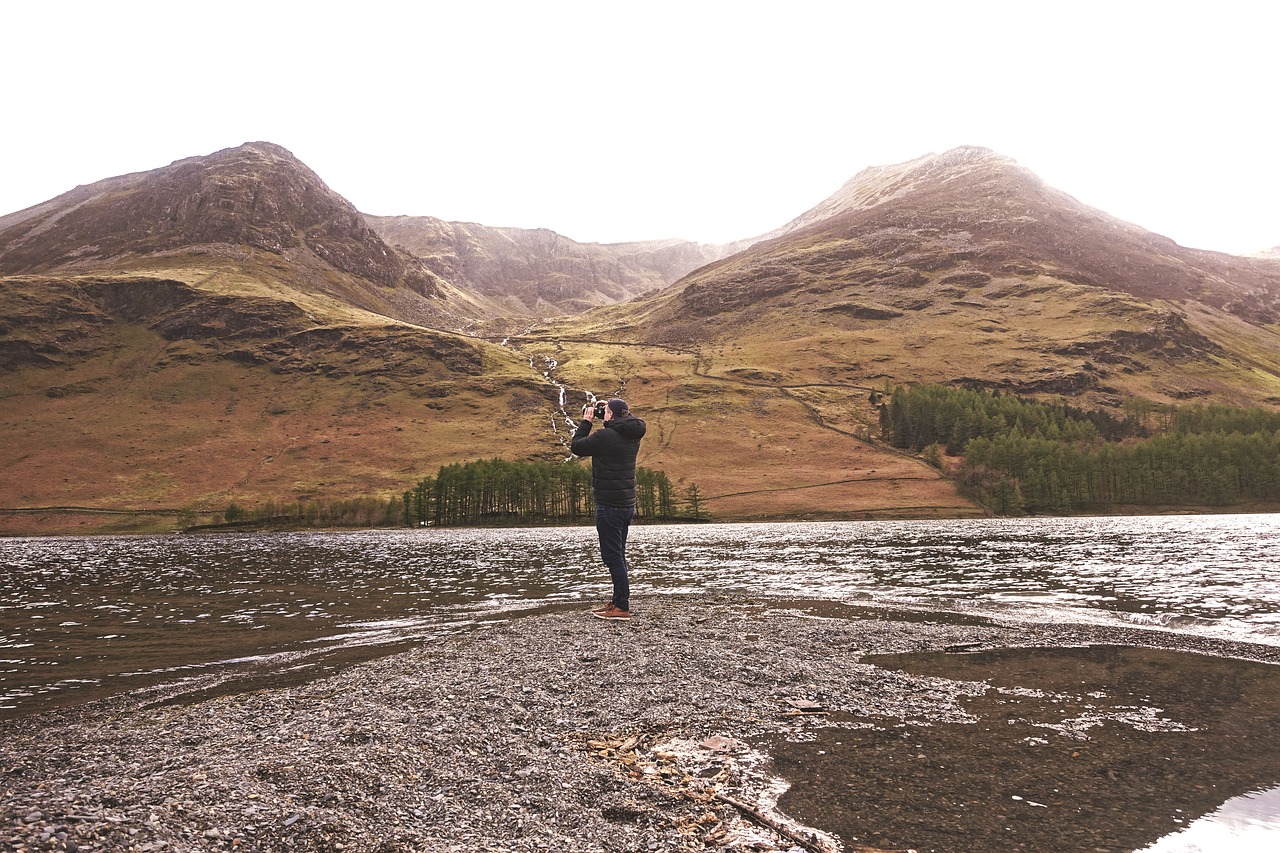 hills landscape man free photo