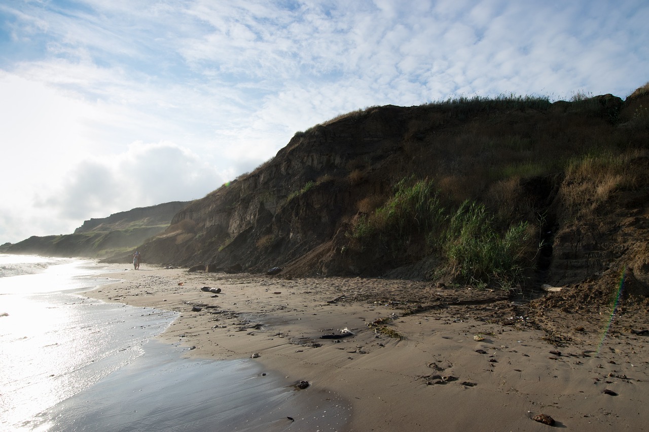 hills beach sky free photo