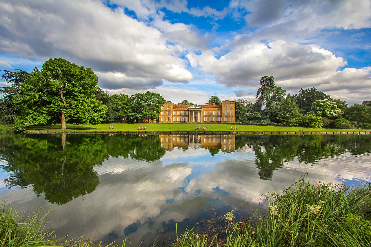 historic building lake reflection free photo