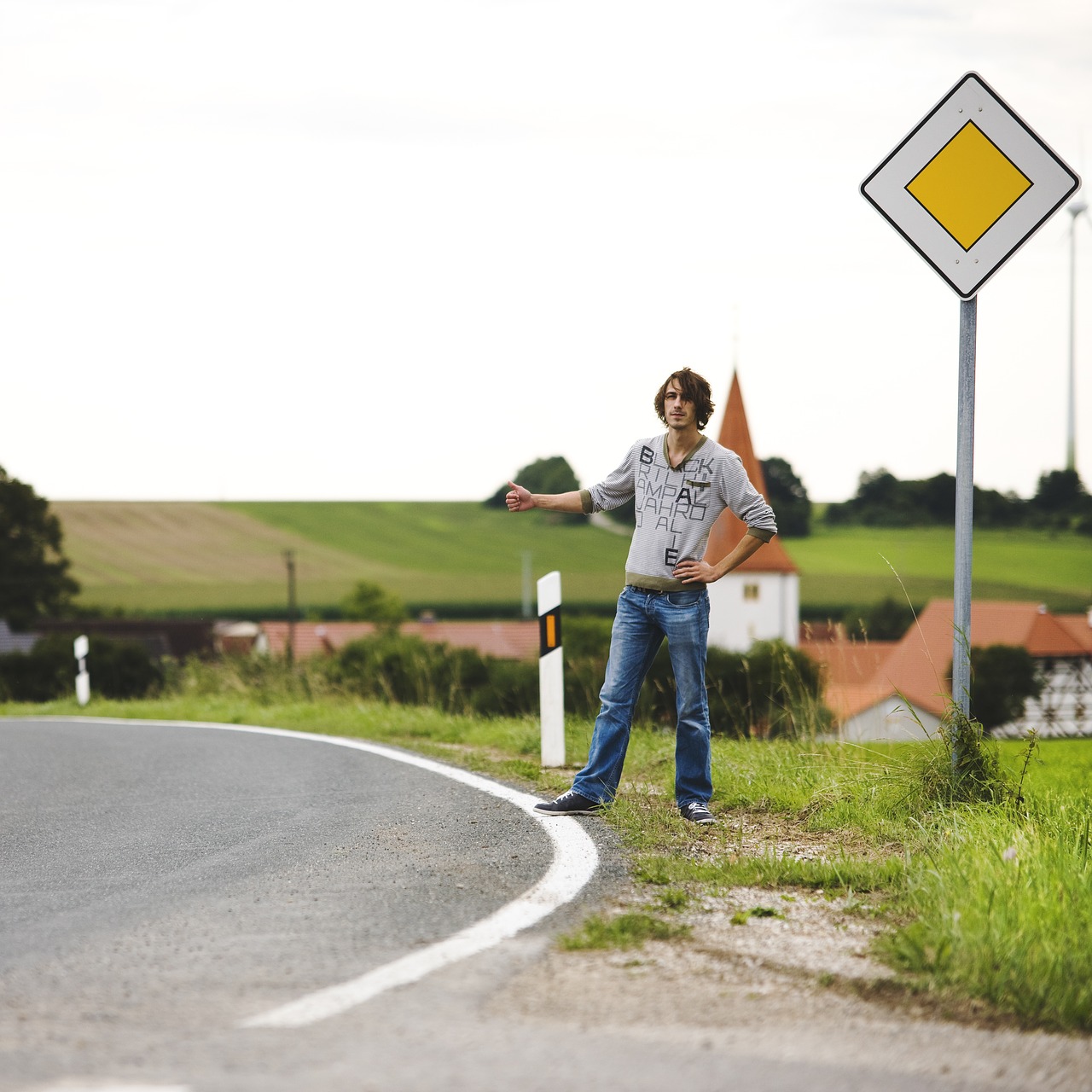 hitchhiker auto stop young man free photo