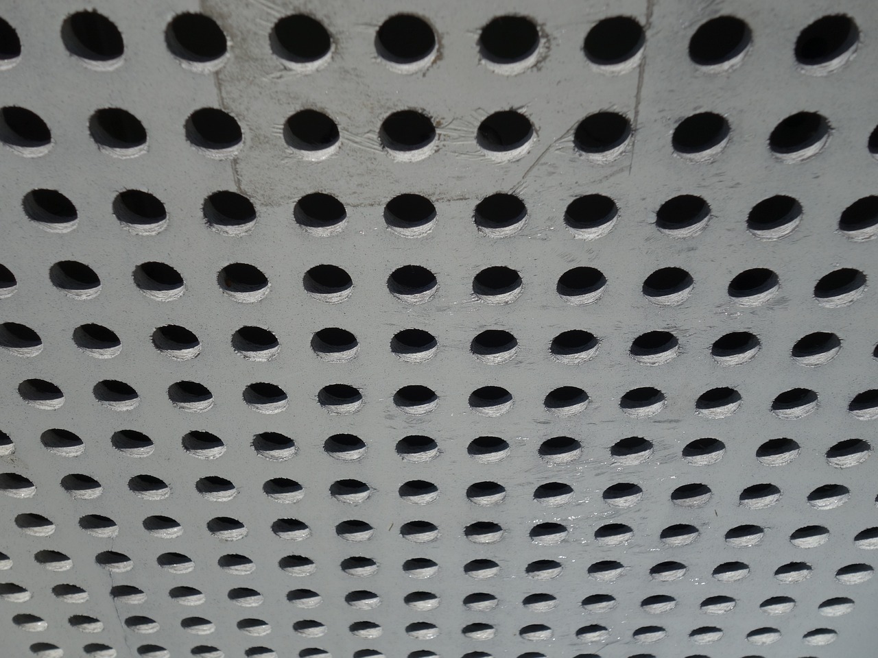 holes concrete cover free photo