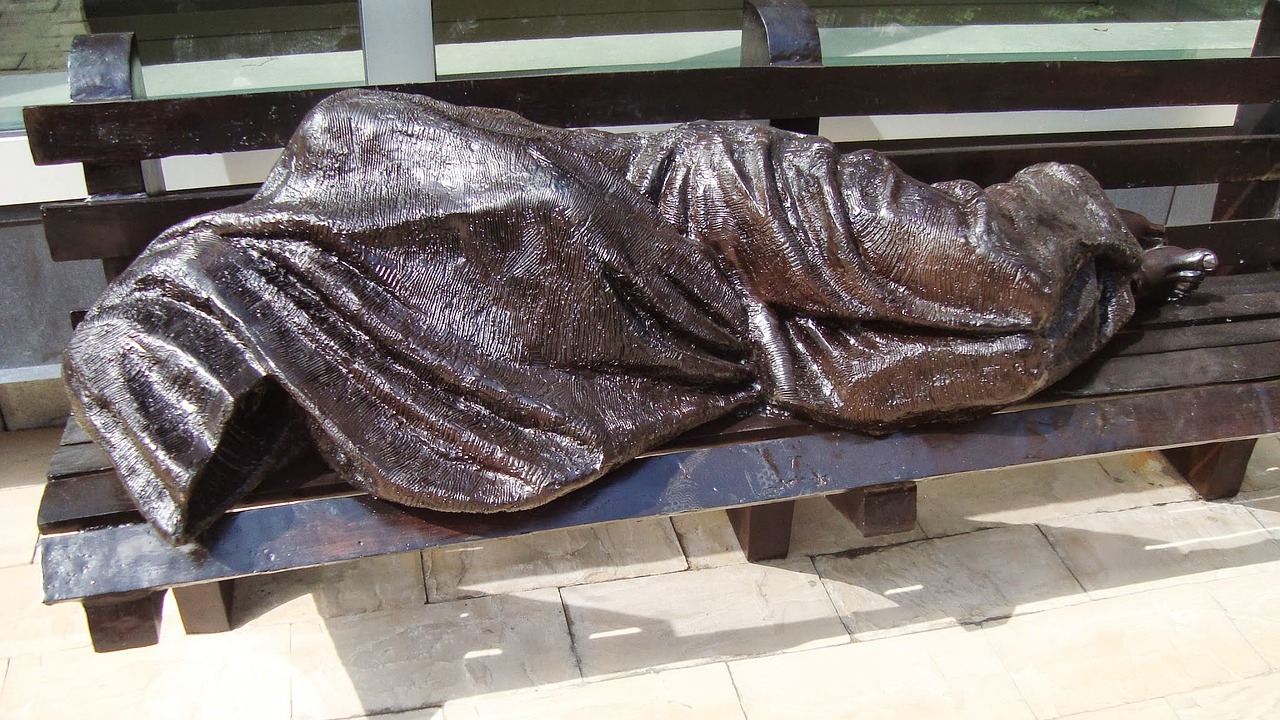 homeless statue city streets free photo